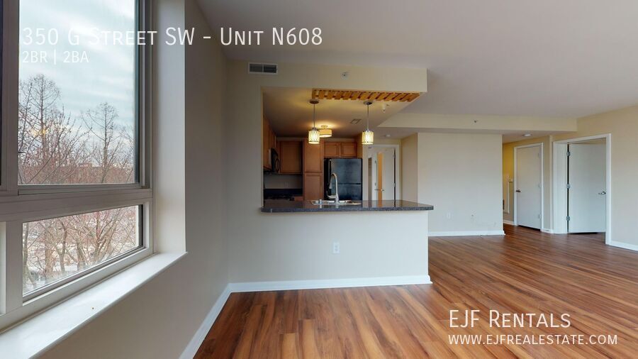 Spacious 1,000 Square Foot Two Bedroom Condo in HOT Southwest Market- Parking Included, Washer/Dryer In Unit & Much More! property image