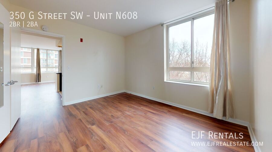 Spacious 1,000 Square Foot Two Bedroom Condo in HOT Southwest Market- Parking Included, Washer/Dryer In Unit & Much More! property image
