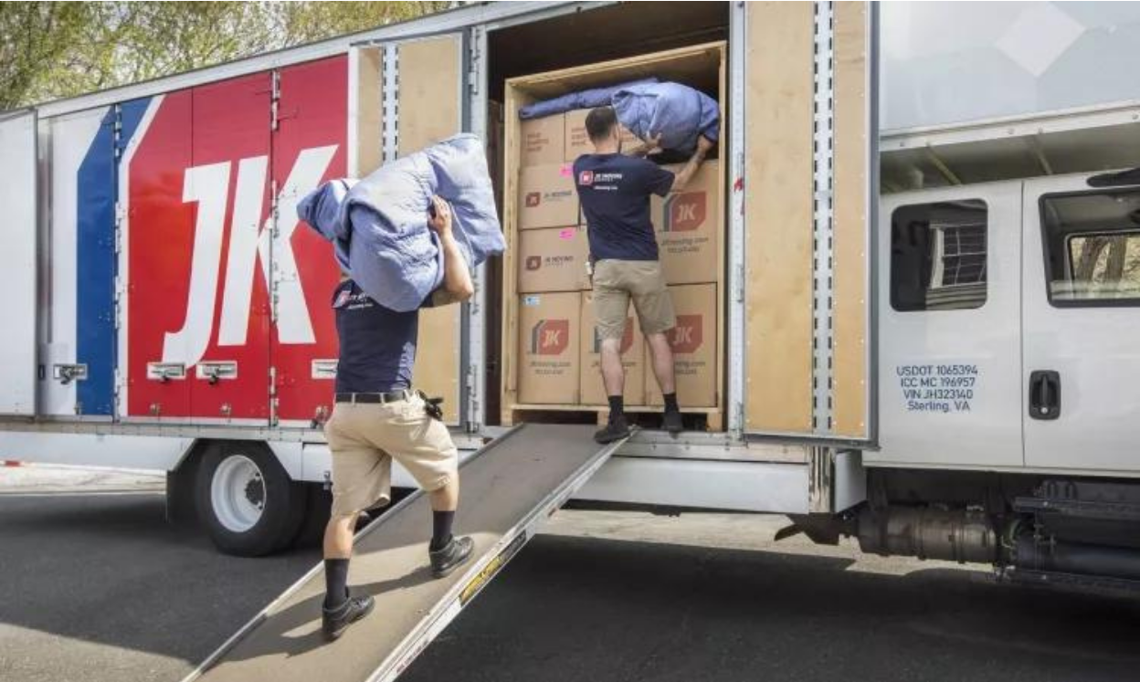 person carrying a boxes